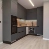 Современная угловая кухня с профилем Gola и матовыми фасадами в ПВХ пленке в Можайске